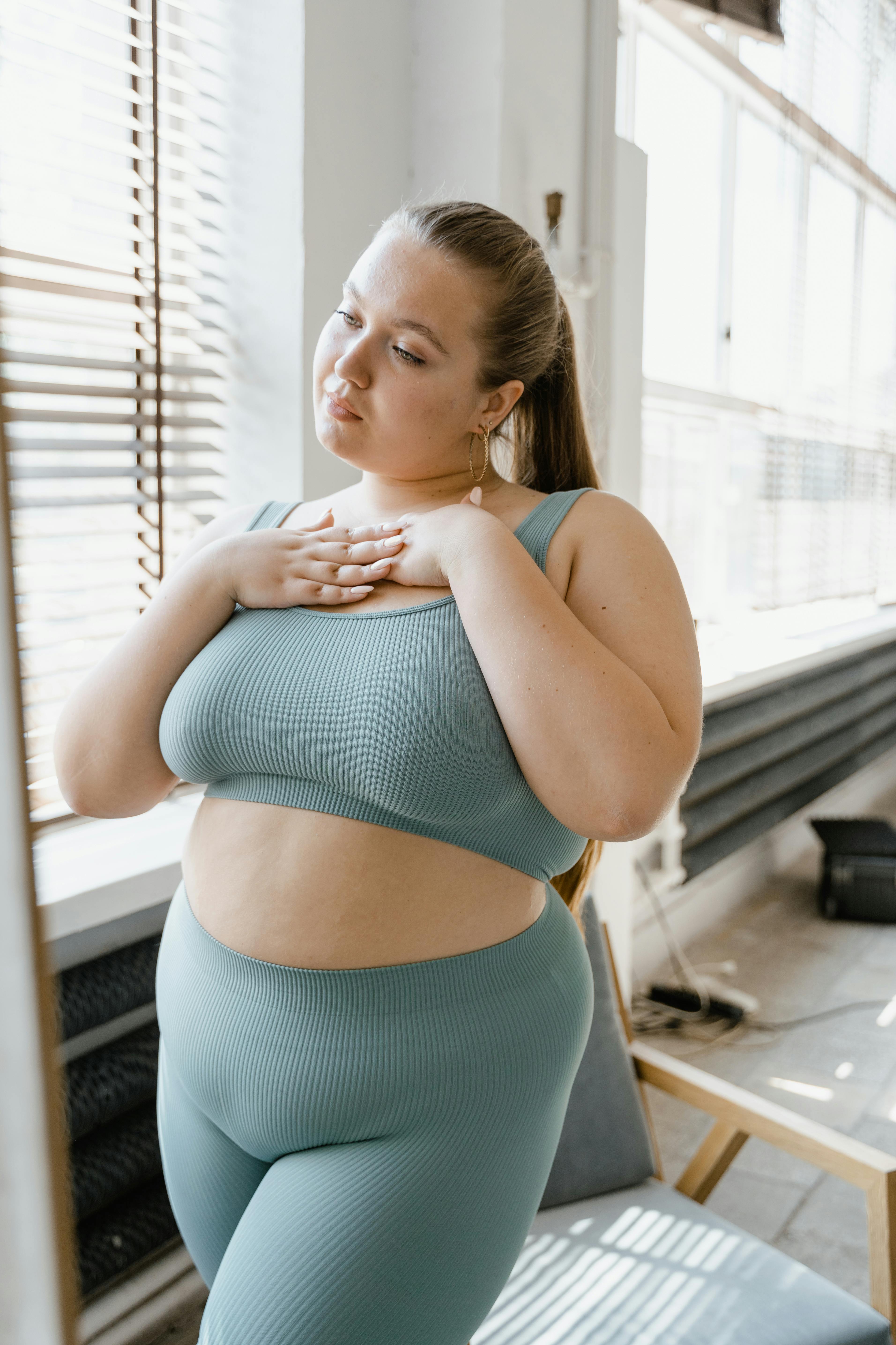 Woman in Teal Tank Top
